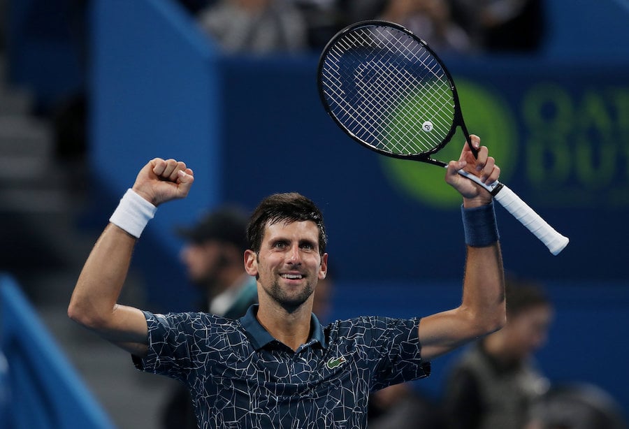 Djokovic into Qatar quarter-finals after scare