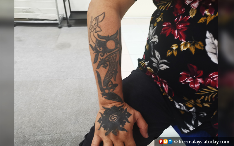 https://media.freemalaysiatoday.com/wp-content/uploads/2019/05/The-Kala-lengan-arm-scorpion-tattoo-FMT.jpg