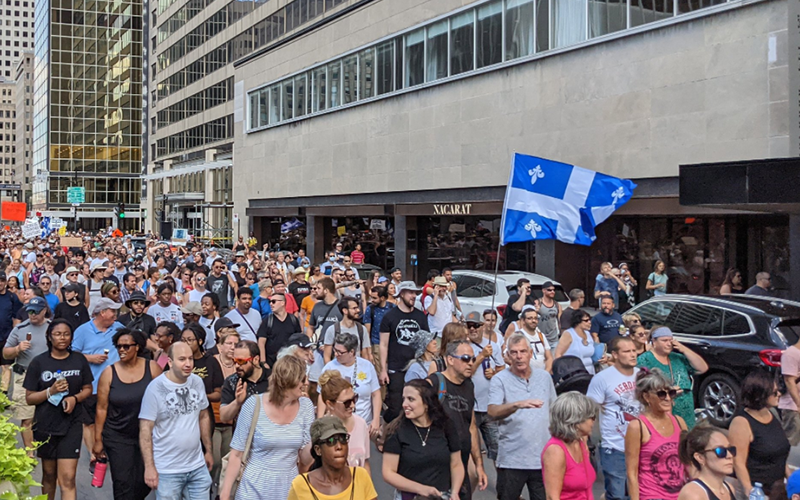 ‘Vaccine scam’: Thousands protest in Montreal against vaccine passport