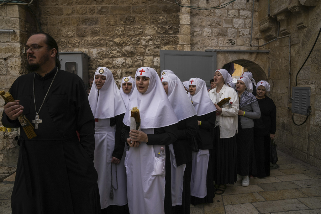 Israel’s Orthodox Christians await Holy Light under heavy police presence