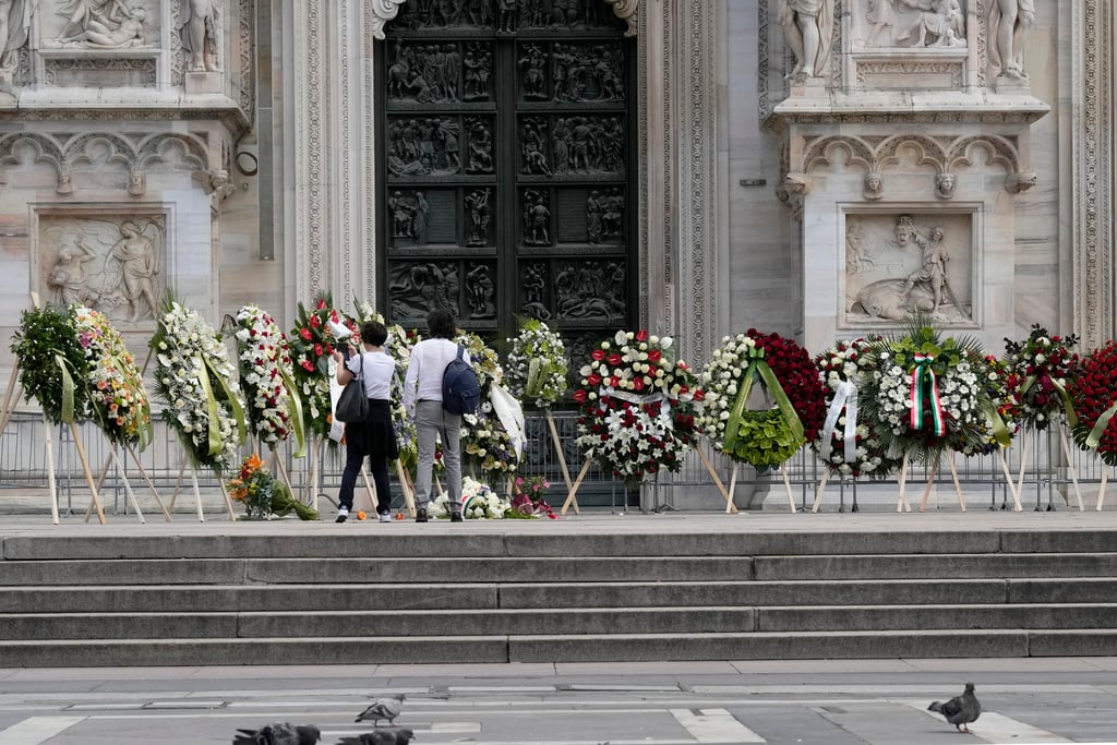 Italy bids farewell to Berlusconi on contested day of mourning