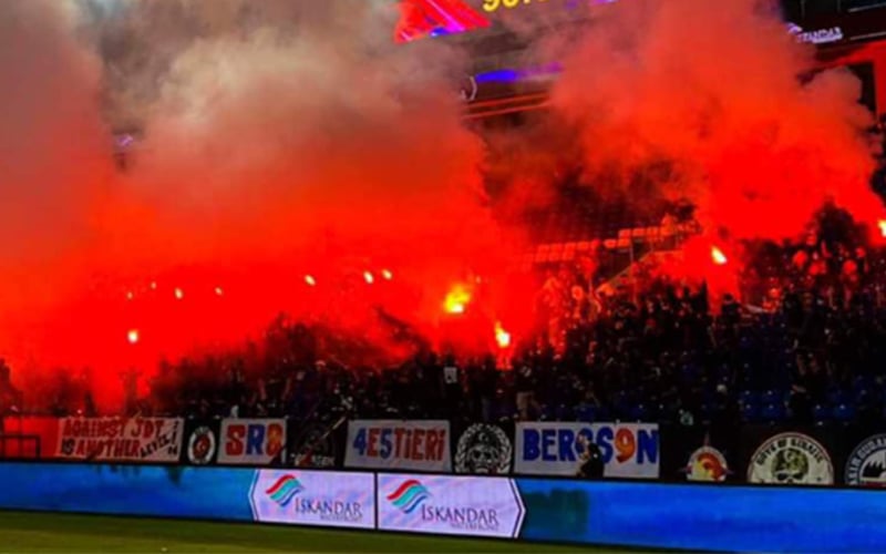 Football fans flare up against JDT over flares in stadium