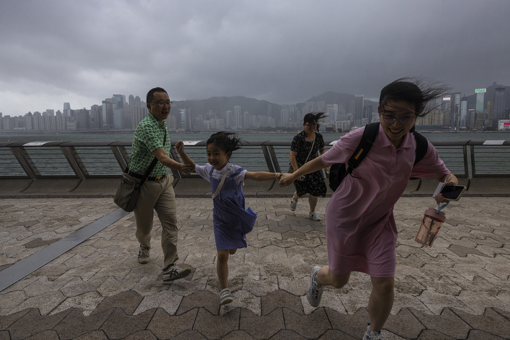 Thousands evacuated as typhoon pummels China, Vietnam