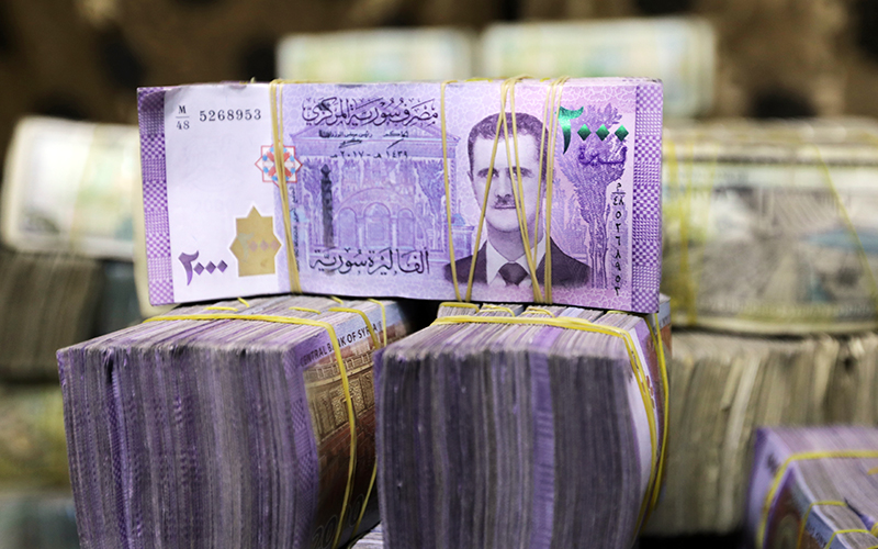 syrian-pound-falls-to-near-10-000-against-dollar-fmt