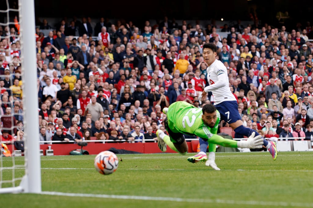 Son's double earns Tottenham 2-2 draw at Arsenal