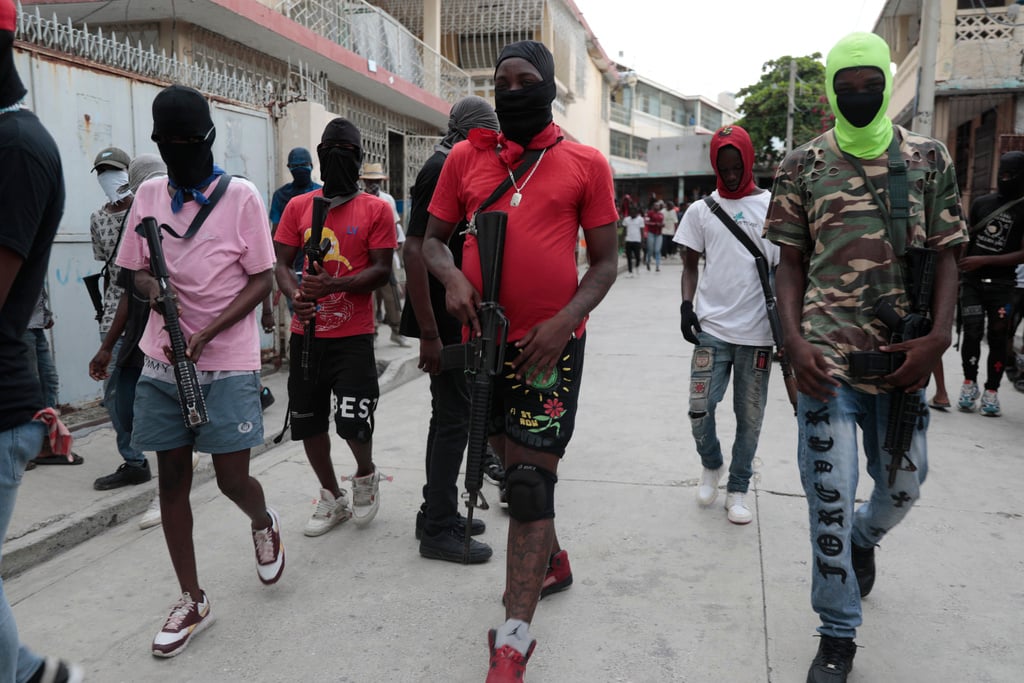 Inmates escape after gangs storm Haiti’s main jail