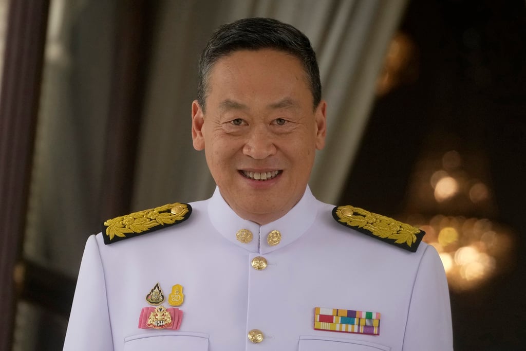 Thailand’s king swears in new PM and cabinet