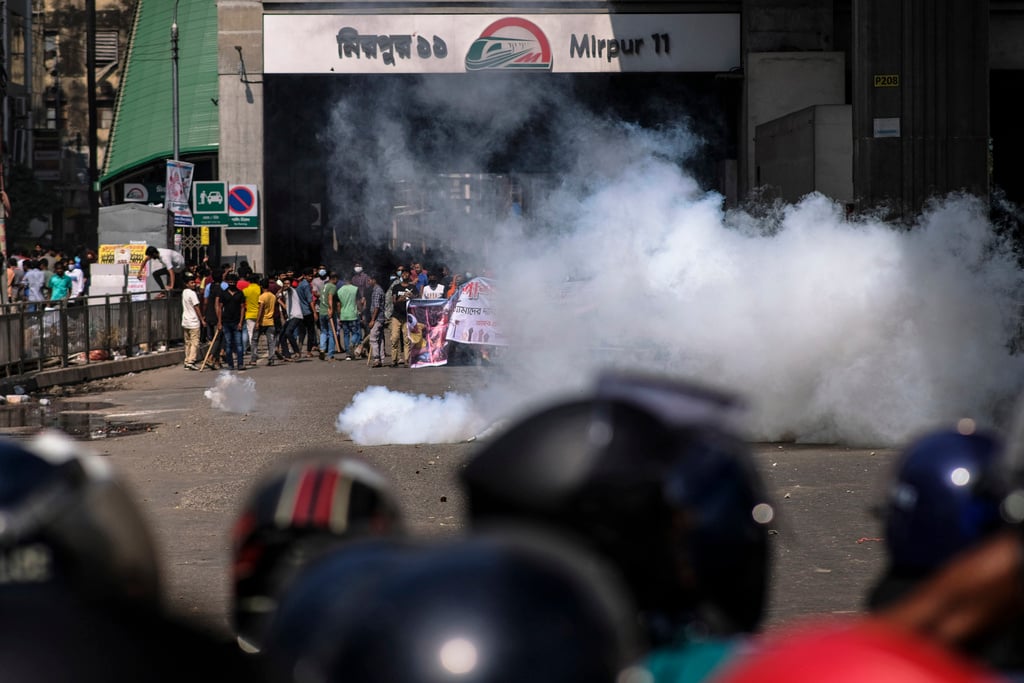 Bangladesh’s garment workers, cops clash as factories reopen