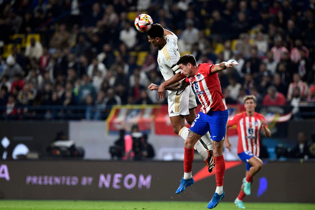 Last-gasp goals earn Real 5-3 win over Atletico