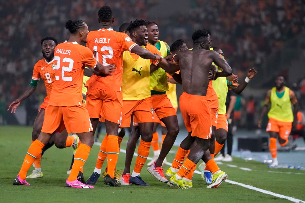 Ivory Coast put past calamities aside as they squeeze into semis