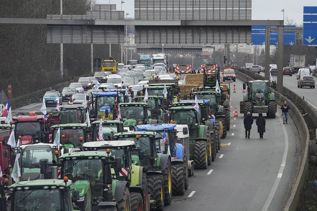 French farmers protest near Paris’s Arc de Triomphe