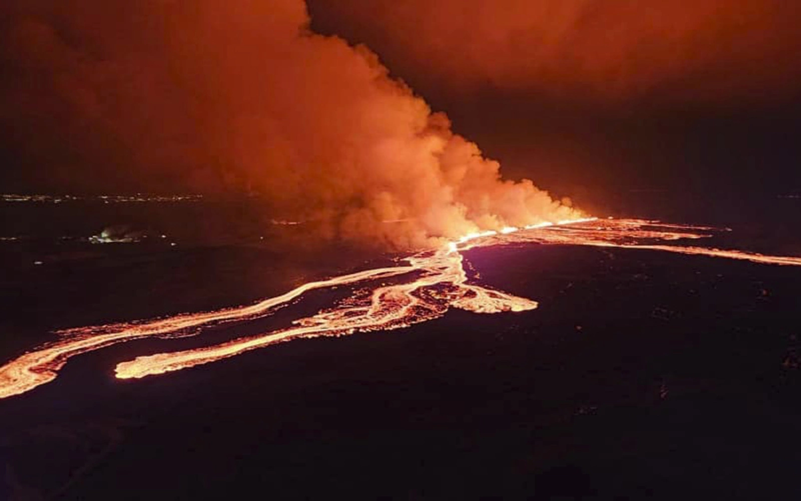 Iceland’s volcanic eruption slows as lava flows from second fissure