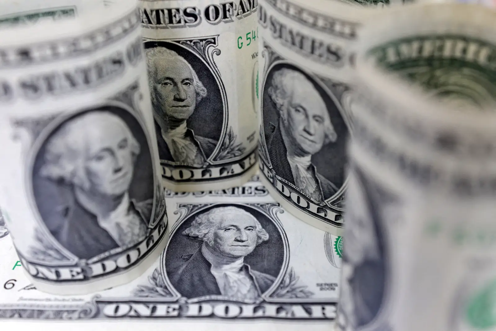Currencies calm but cautious after a weary week