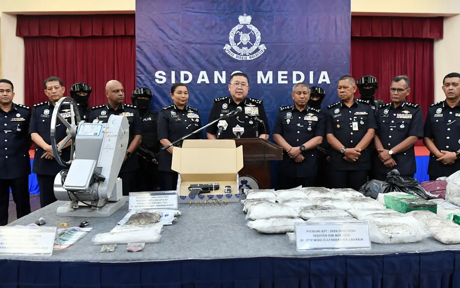 Police detain couple, seize pistol, drugs worth RM4.73mil | FMT