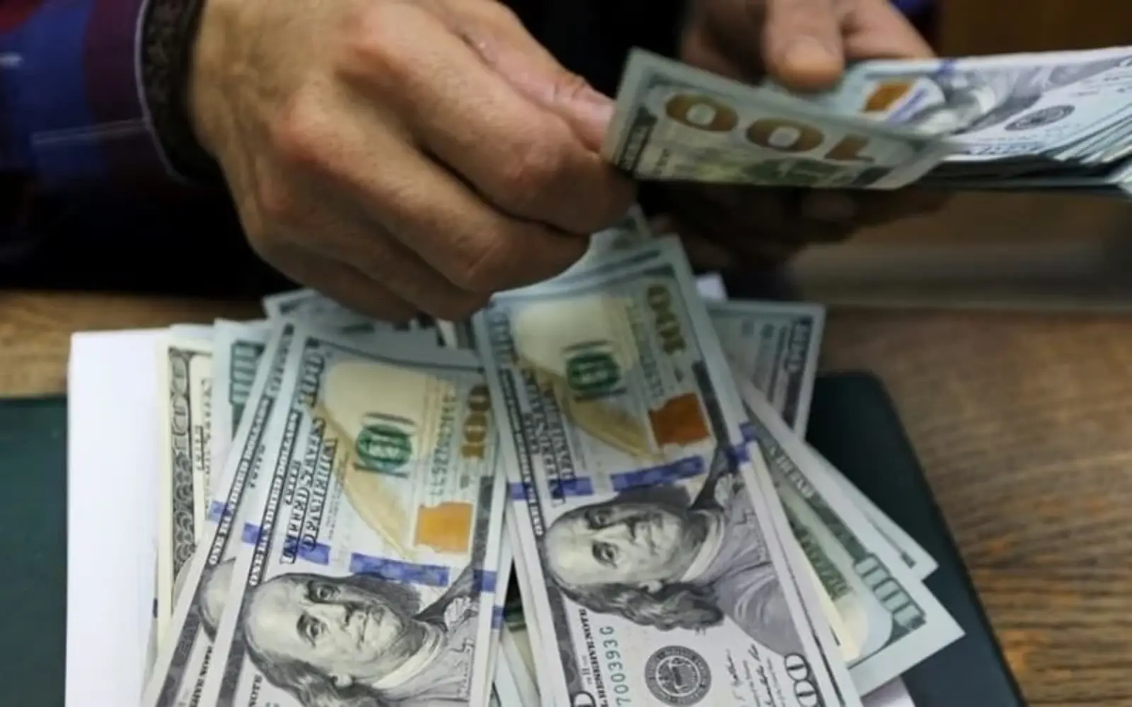 Dollar firm ahead of global inflation data