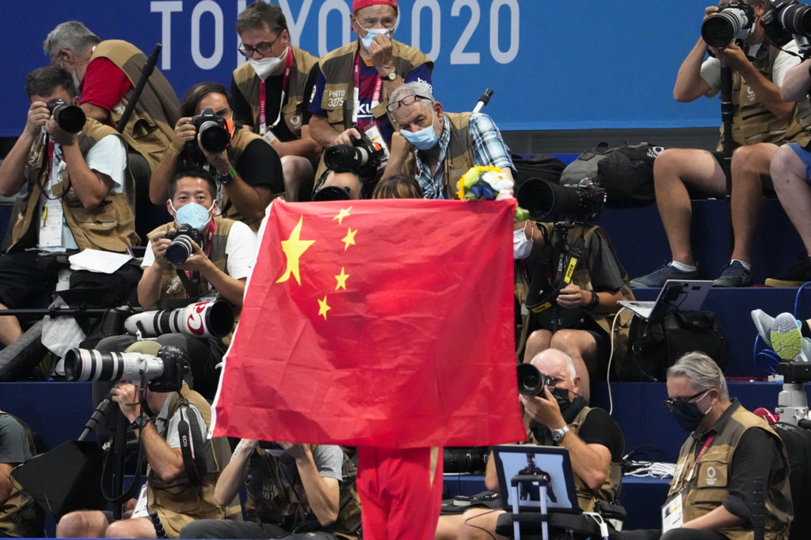 3 swimmers in China doping scandal failed earlier tests