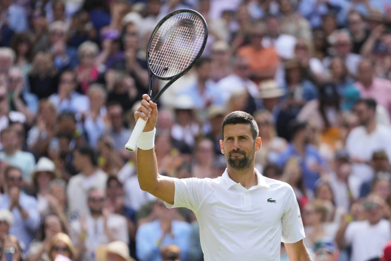 Djokovic survives spirited challenge from British wildcard Fearnley