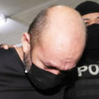 Ex-lecturer, contractor charged with possessing IS material 5