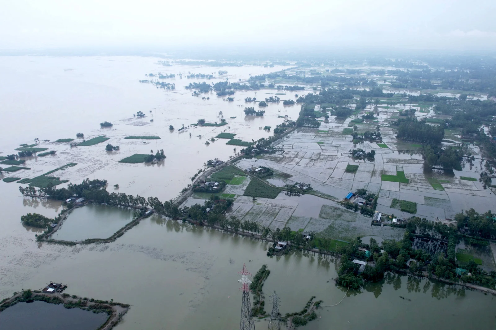 Floods hit Bangladesh as country regains its bearings after protests