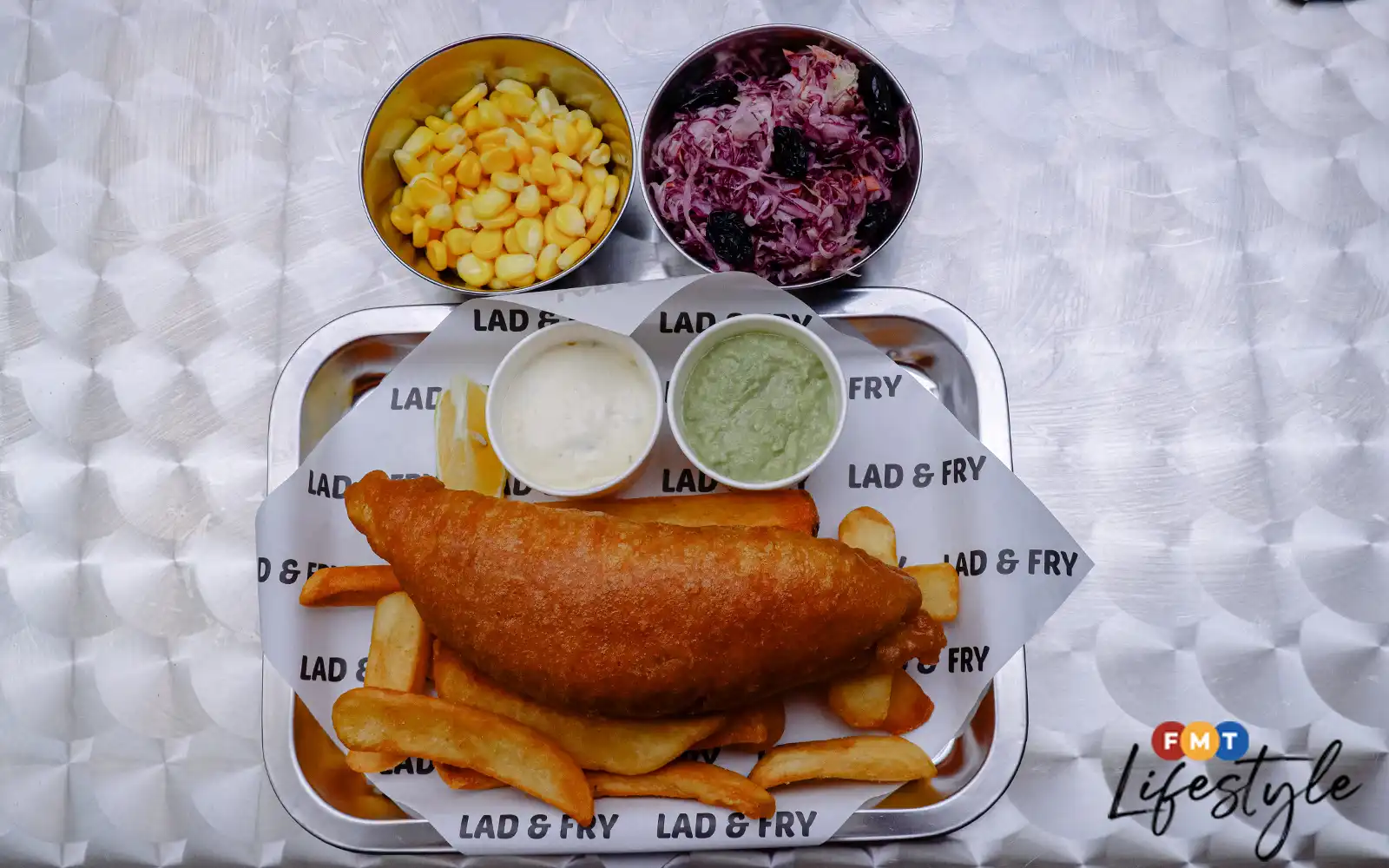 Let yourself be tempted by the delicious fish and chips from Lad & Fry