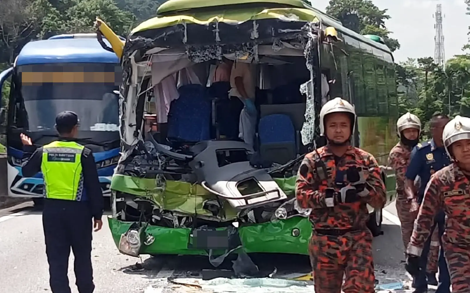 11 Japanese tourists among 13 injured after tour bus crashes into trailer lorry