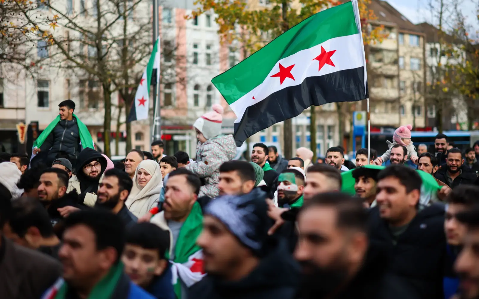 Thousands of Syrians in Berlin celebrate the departure of Assad