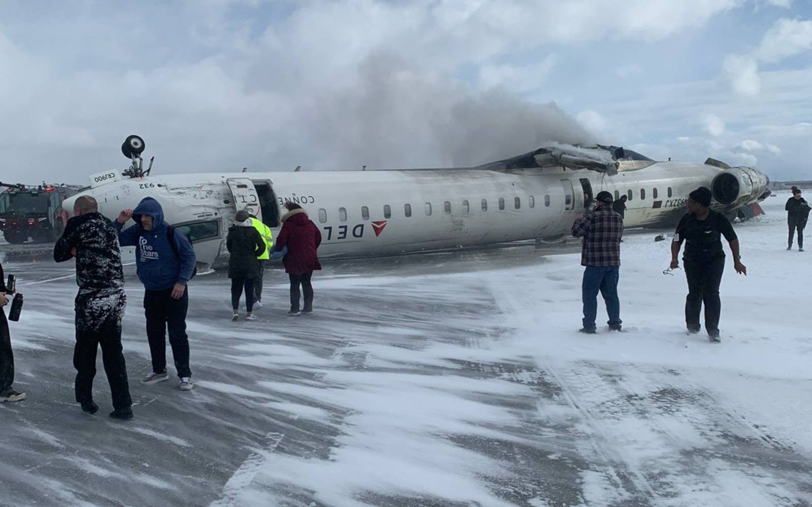 Delta plane flips on landing at Toronto airport, injuring 18