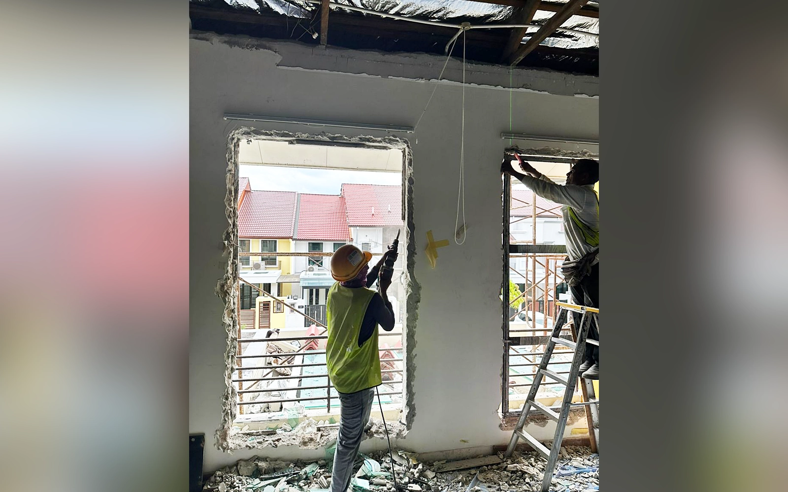 construction workers repairing putra heights