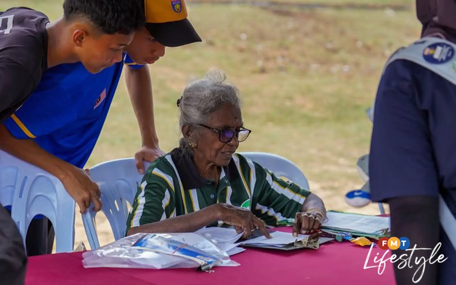RS Selvee guides young athletes before their event 17226