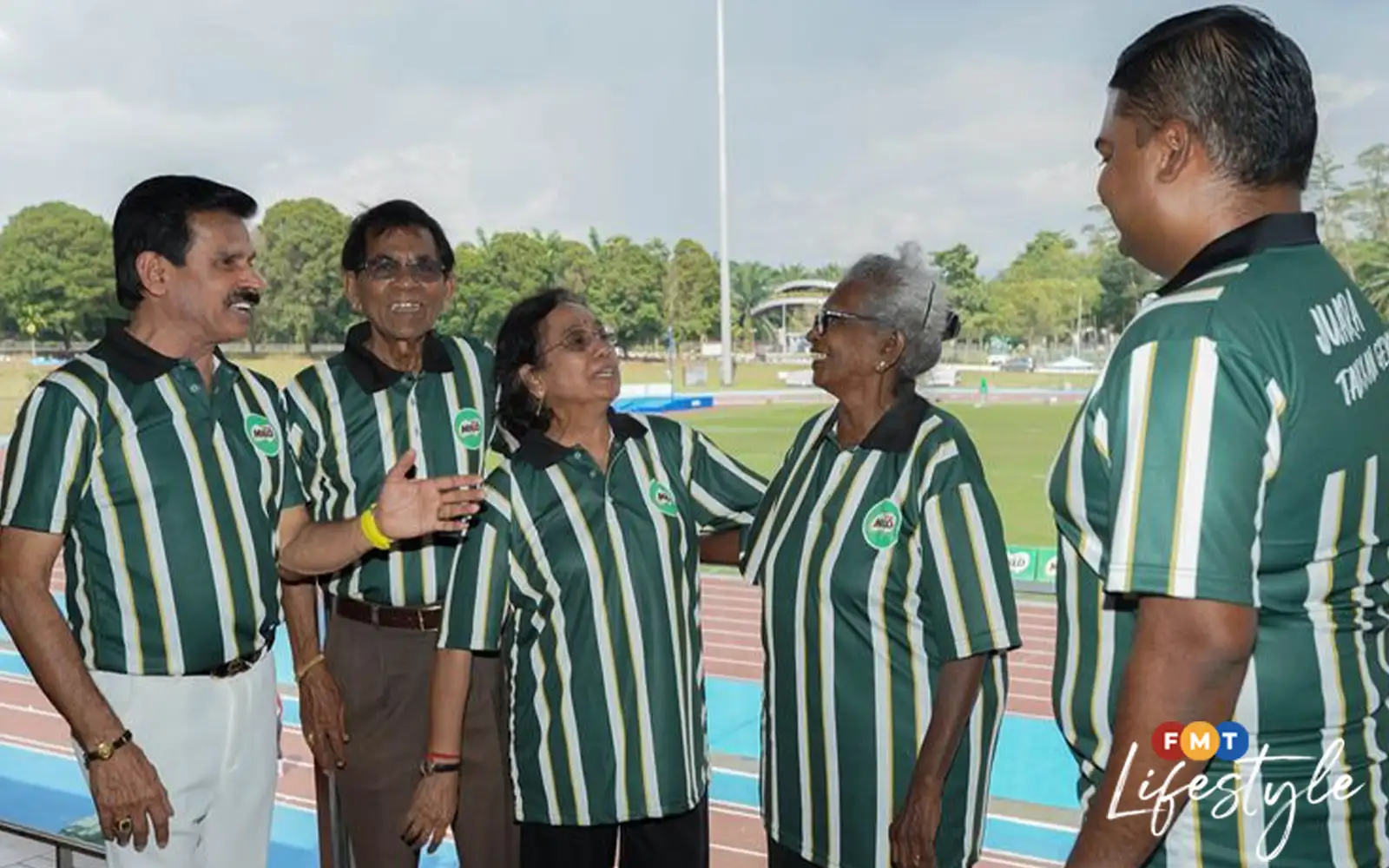 At the centre of the FTAA community, RS Selvee stands with (from left) 17226