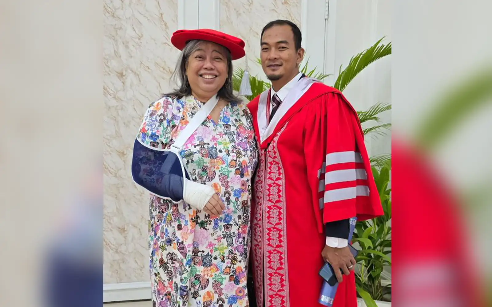 Malik with Hartini, attached. Credit Malik pic 7226